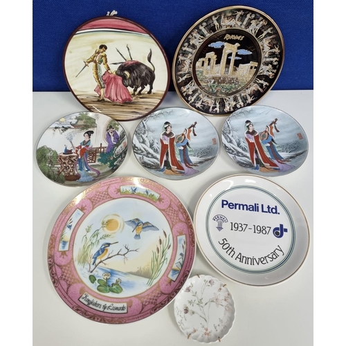 489 - A collection of eight decorative plates, to include a hand-painted example of a bull fighter, signed... 