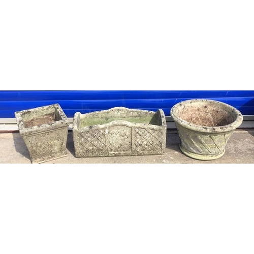 710A - Three different sized stone planters, with similar lattice-pattern design. Round (height 29cm, diame... 