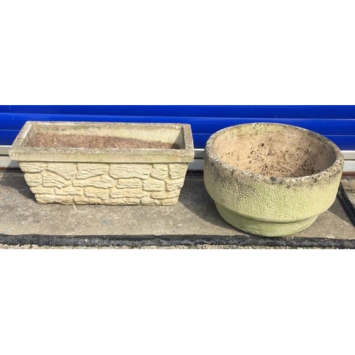 710B - Two individual stone planters. Round (height 29cm, diameter 52cm), trough (height 27cm, width 66cm, ... 