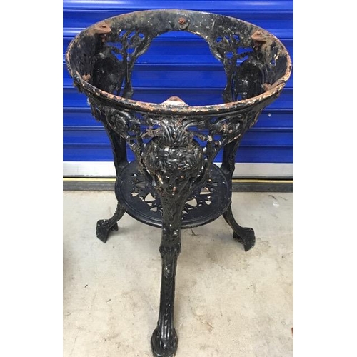 713 - A cast iron, garden table base, without table-top. Height 67cm, diameter 46cm.