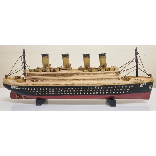 2020 - A hand-painted, resin 'Titanic' model, with a fabric rope detail. Mounted on wooden plinths. Model l... 