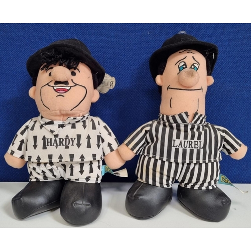 1822 - 'Laurel' & 'Hardy' soft toys, by 'We're Bananas', one with original label. Tallest height 30cm.