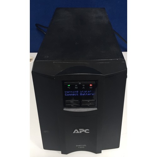 3065 - An 'APC Smart-UPS 1000' power back-up tower.