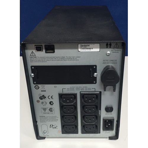 3065 - An 'APC Smart-UPS 1000' power back-up tower.