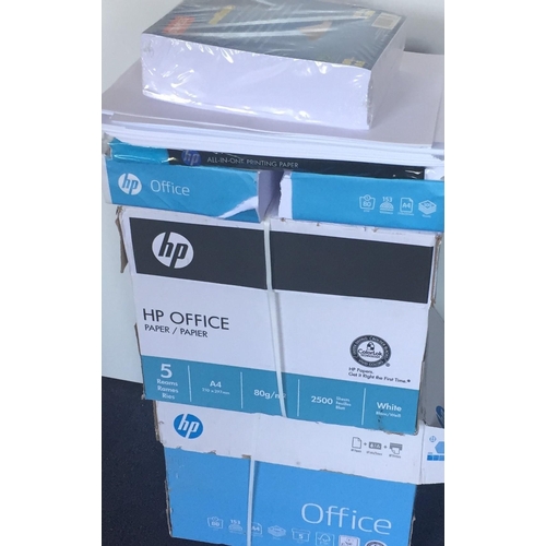 3103 - Two full boxes of HP Office paper, together with a quantity of A5 paper.