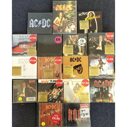 3305 - AC/DC - a collection of mostly new/unplayed CD's (x17) & DVD