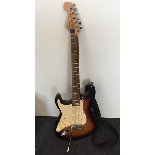 3667 - A Fender 'Squier Strat' electric guitar (Affinity series). Also able to play left-handed. Serial num... 