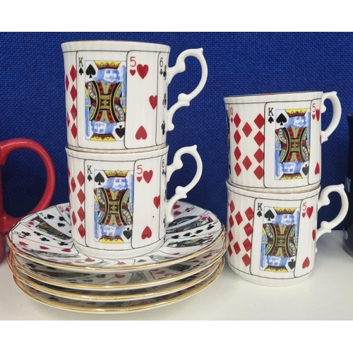 556 - An eight-piece set of novelty 'Elizabethan' 'Cut for Coffee' card themed coffee cans & saucers, toge... 