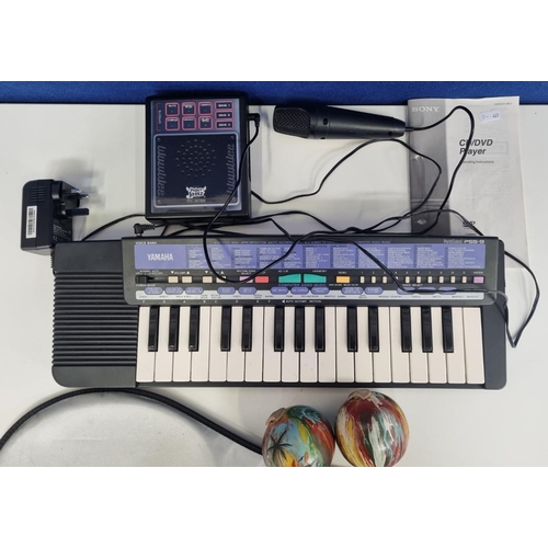 796 - A selection of musical & sports entertainment items, to include a 'Yamaha' keyboard, a 'WowWee' 'Pro... 