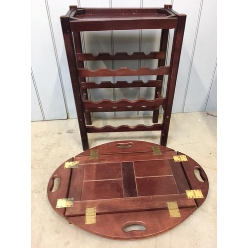 19 - A hinged-topped butler's tray/wine rack, together with a similar styled magazine rack. Respective di... 