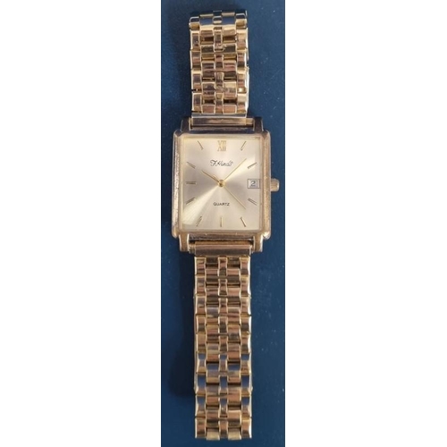 385A - An 'F. Hinds' gents, gold-tone watch in original box. Square face & link bracelet.