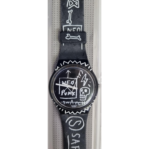 393F - An unused 'Swatch' 'Bad Trip' battery operated watch, with a graffiti inspired rubber strap & origin... 