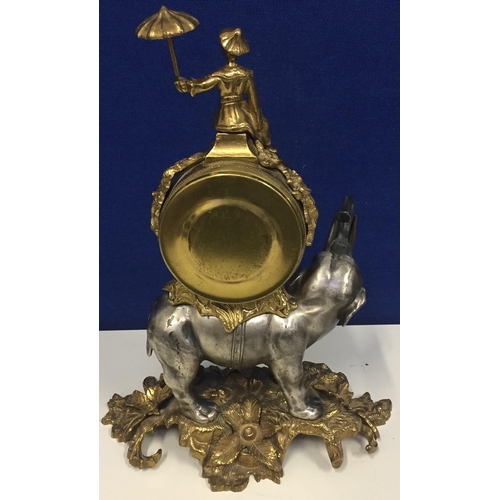 402 - An Italian 'Brevettato' brass & bronze elephant mantel clock. The top heightened by a Chinese figure... 