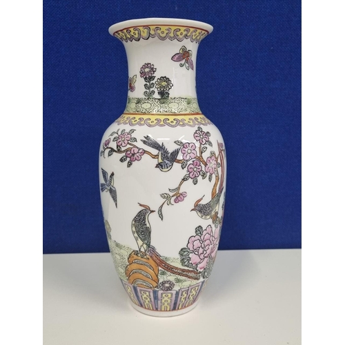 497D - A vintage Chinese painted ceramic vase, with a flora & fauna motif. Additional hole to base, possibl... 