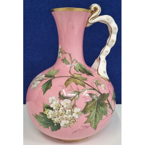 523A - A mid/late 19th 
century 'Minton' pink ground vase. A single-handled, ornately gilded example, with ... 