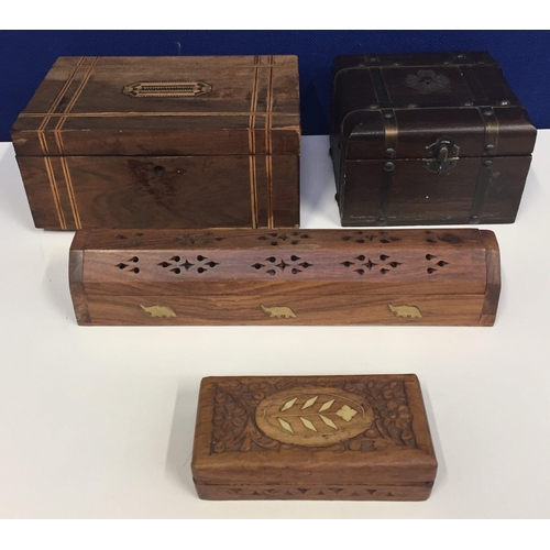 683 - A collection of four decorative wooden boxes. Two inlaid, one square shaped, with metal decoration.