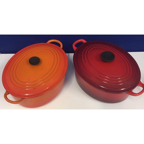 691 - Two 'Le Creuset' lidded casserole dishes. In cerise & volcanic colours. Both well used.