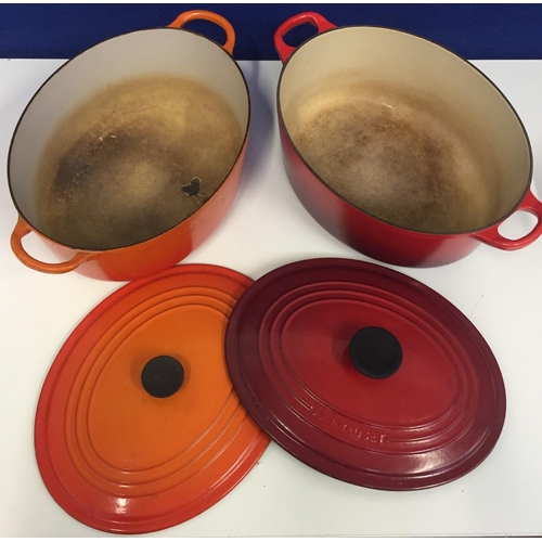 691 - Two 'Le Creuset' lidded casserole dishes. In cerise & volcanic colours. Both well used.