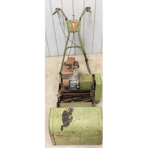 711J - A vintage 'Webb' petrol lawn mower with grassbox, by Briggs & Stratton. Untested.