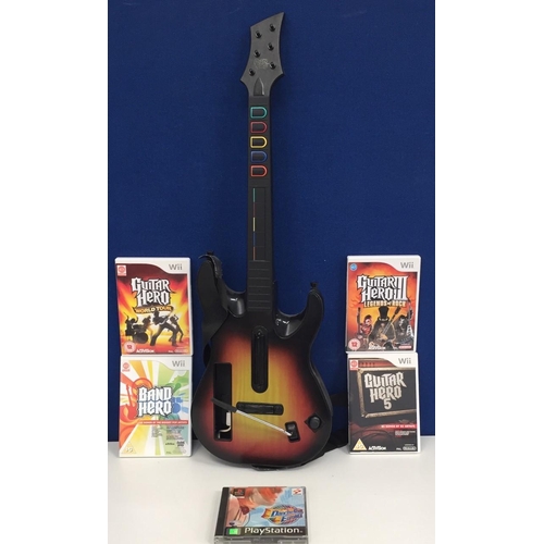 756 - A 'Guitar Hero' guitar, with the following Wii games: - 'Guitar Hero World Tour', 'Guitar Hero 5' 'G... 