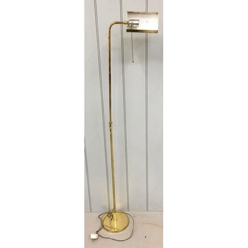 788 - A tall brass reading lamp. Tested & appears in full working order. Height 145cm