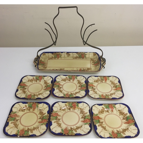 624H - A Bursley 'Bacchus' pattern sandwich plate with six side plates, one plate shows signs of repair.