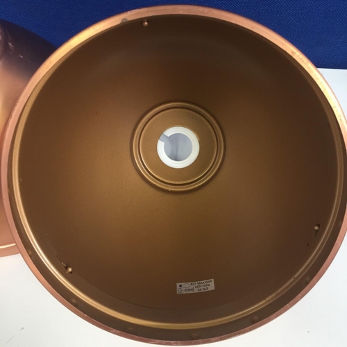 649 - A pair of matt-copper, dome lightshades.