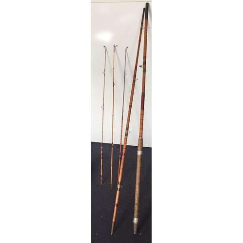 743 - Three vintage, cane fishing rods, together with a fishing umbrella. To include a 'Sydney Jarvis' thr... 