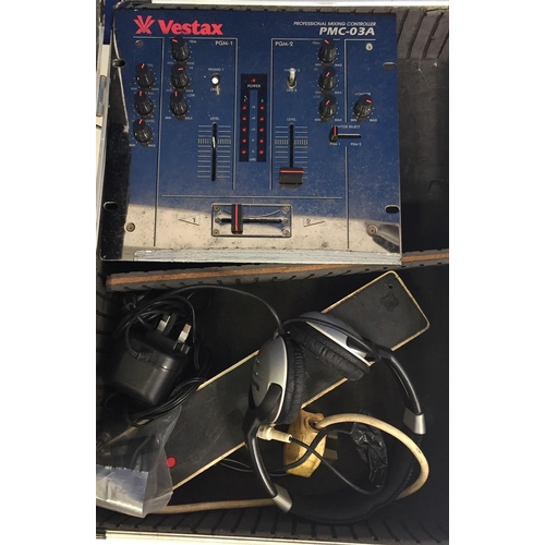 3038 - A 'Vestax PMC-03A Professional Mixing Controller', with Numark HF125 headphones & protective flight ... 