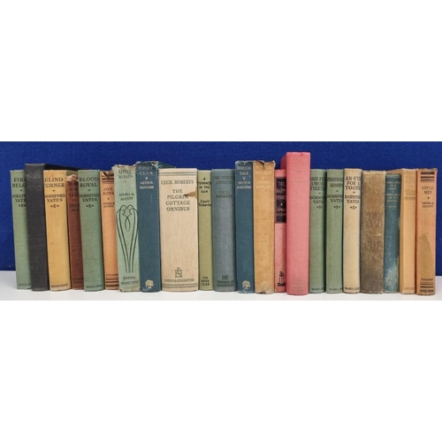 3229 - A larger quantity of vintage fiction novels, including classics by L.M. Alcott. Twenty two books in ... 