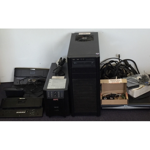 3085 - Assorted PC parts for spares/repairs. To include a Toshiba laptop with two docking stations, APC Sma... 