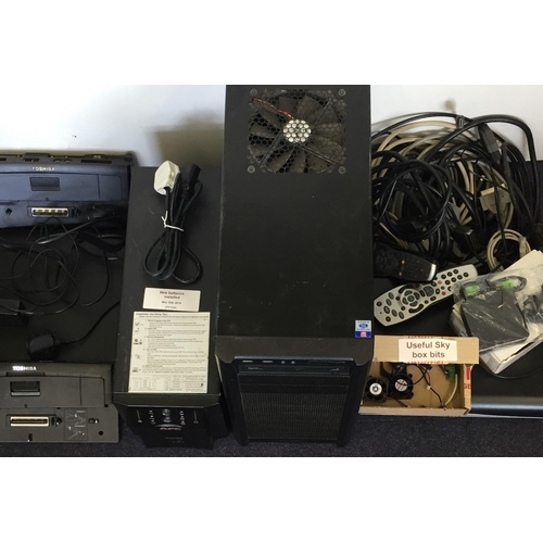 3085 - Assorted PC parts for spares/repairs. To include a Toshiba laptop with two docking stations, APC Sma... 