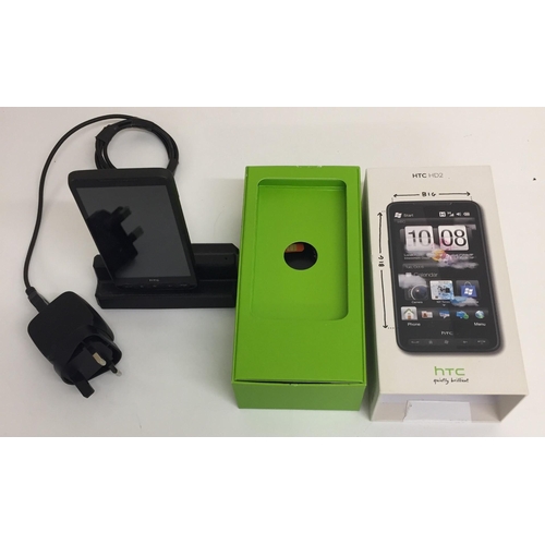 3091 - A used HTC 'HD2' mobile phone, with original box & charger. Tested & appears in full working order.