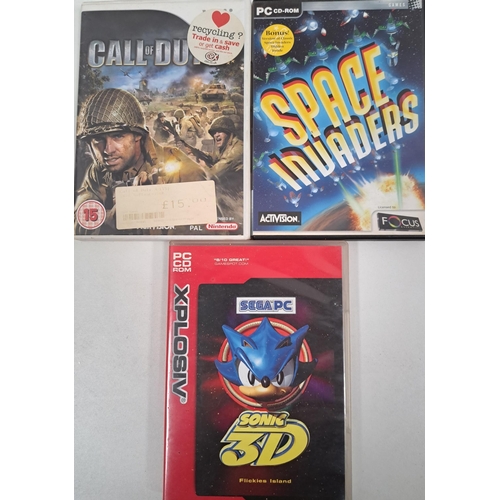 3092 - Three Wii & Pc games. To include 'Call of Duty', 'Space Invaders' & 'Sonic 3D'.