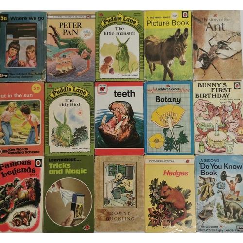 3250 - A large collection of approximately sixty-nine Ladybird books. To include early editions of 'Snow Wh... 