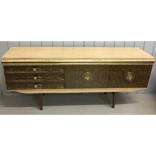 120 - A Beautility-style, mid-century sideboard. Three drawers & single door cupboard, aside a fall front ... 