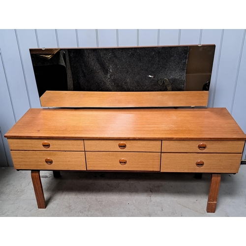 121 - A mid-century teak, six-drawer, dressing table, by 'Schreiber'. Dimensions(cm) H110, W150, D43.