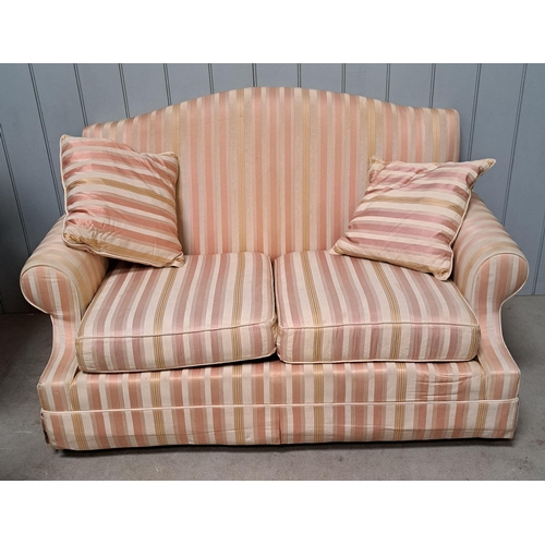 144 - A vintage-style, two-seater sofa, upholstered in striped fabric. Some minor staining & a small tear ... 