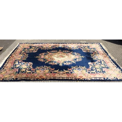 193 - A large 20th century, likely Chinese rug, with a central floral medallion & outer frame, on a Royal ... 