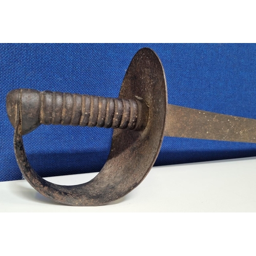 268 - A British naval cutlass of '1845' pattern, with an all iron hilt, ribbed grip & flat blade. Blade le... 