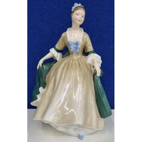 512 - A Royal Doulton 'Elegance' lady figurine. Height 19cm.