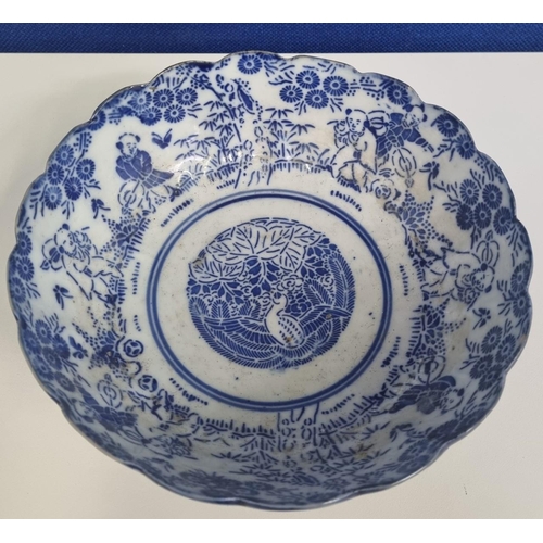 534B - A Japanese Meiji period 'Arita' blue & white porcelain bowl with scalloped edging. Dimensions(cm) H9... 