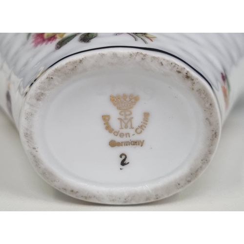 534F - A trio of quality ceramics, to include a transfer print floral 'Dresden' decorative basket, a 'Foley... 