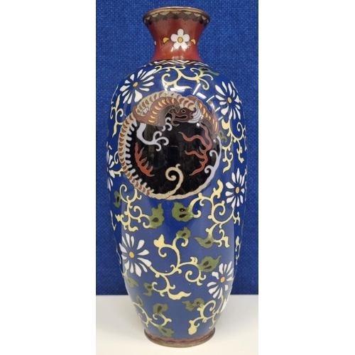 541 - An attractive Japanese cloisonné vase, with stylised dragon & phoenix motif. Height 22cm.