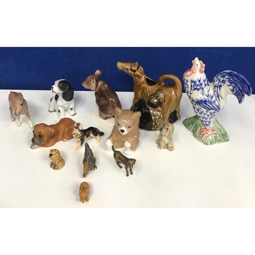 558 - An assortment of thirteen good quality animal figures, to include a 'Lomonosov' bear cub, a 'Beswick... 