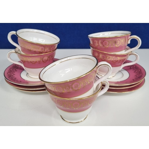 615 - A group of late 19th/early 20th century 'Coalport'  rare pattern, pink gilt cabinet cups & saucers. ... 