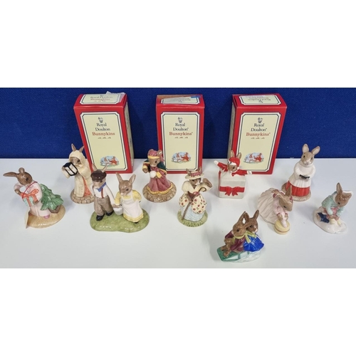 618 - A larger lot of boxed 'Bunnykins' figurines by Royal Doulton, to include a 'Girl Skater, 'Bo Peep' &... 