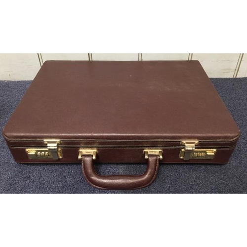 668A - A vintage, leather briefcase, together with a vintage, soft leather document case (with key).