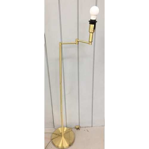 789 - A tall, elbow-jointed, brass-coloured lamp. Tested & appears in full working order. Height 131cm.