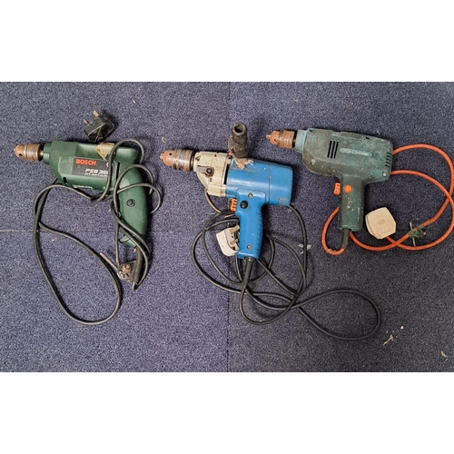 805 - Three electric drills. To include Black & Decker SLK15 & S6A22, together with A Bosch PSB350. Tested... 